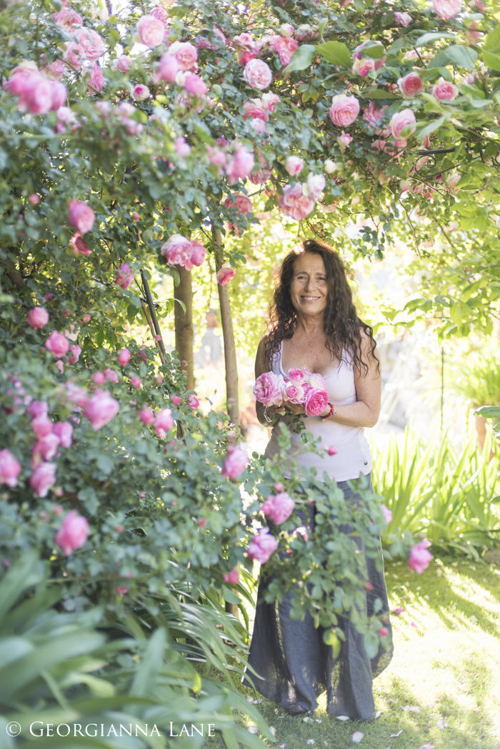 María Cecilia photographed in her rose garden in El Arrayan, Chile, by Georgianna Lane